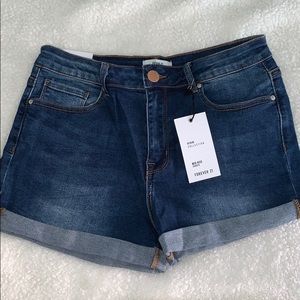 Mid rise dark denim shorts